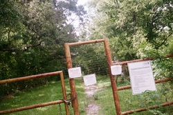 A fence with signage