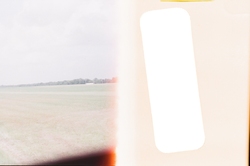 A field. Half of the image is washed out.