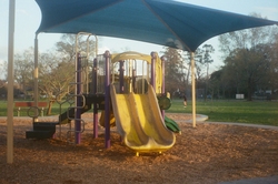 Playground slides with canopy